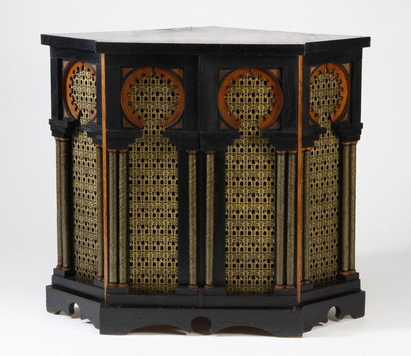Rare corner cabinet designed by Carlo Bugatti: Rare corner cabinet by renowned Italian designer Carlo Bugatti, originally installed in a Montevideo, Uruguay café that commissioned Bugatti to design the interior décor. Provenance: from the privat