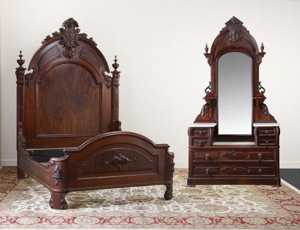 19th c. Victorian carved rosewood bedroom set: Mid 19th c. American Victorian 2-piece carved rosewood and walnut bedroom set with full size bed (99"h x 63"w x 82"l), and marble top stepped-down dresser (92"h x 51"w x 19"d), attributed to Mitchell 