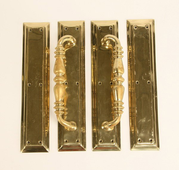Bronze door handles from Wimbledon: Two pairs of English bronze door handles and matching pushplates, removed from the Debentures Bar Centre Court Wimbledon, when this venue was remodeled in 2006, 14.5"l x 3"w.