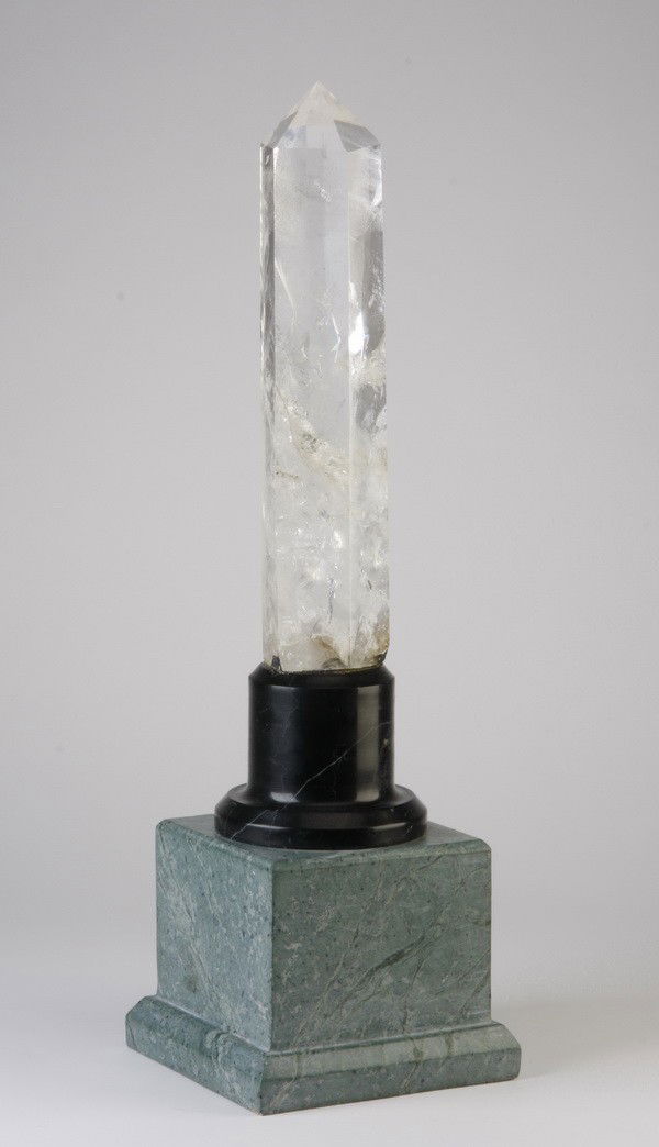 Rock crystal obelisk, 24"h: Large carved rock crystal obelisk on green and black marble base, 24"h x 7" square base.