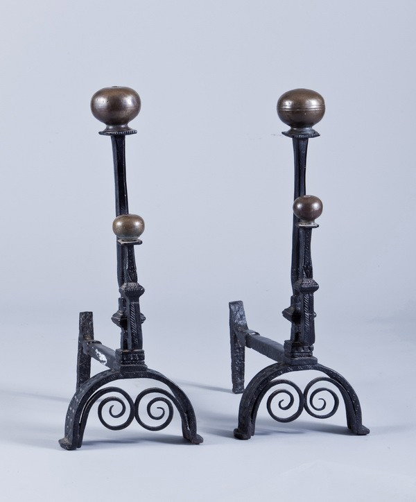 (2) 19th c. brass and iron andirons: Pair of 19th century brass and iron andirons with arched feet, 26.5"h x 17.5"d x 10"w.