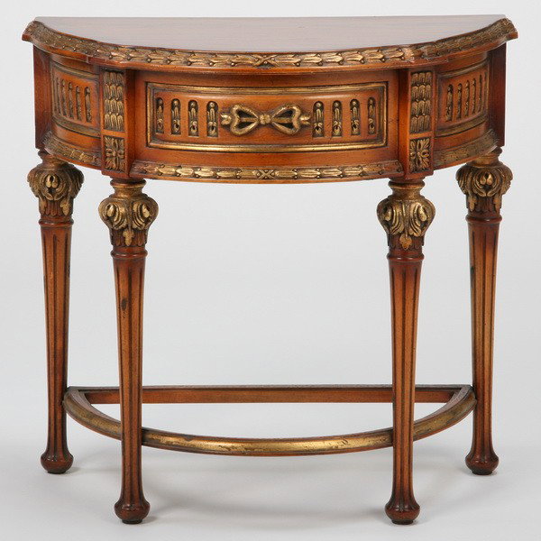 Louis XV-style carved mahogany console: Petite Louis XV-style carved and parcel gilt mahogany demi-lune console with center drawer, 27"h x 27"l x 15"d.