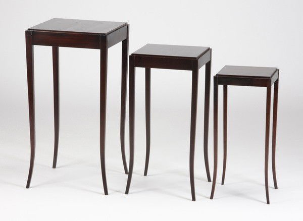 Contemporary Baker Furniture nesting tables: Group of three contemporary mahogany nesting tables, from The Barbara Barry Collection for Baker Furniture, maker marked, includes (1) 28"h x 14.5" square top; (1) 25"h x 12" square top; (1) 22"h x 10
