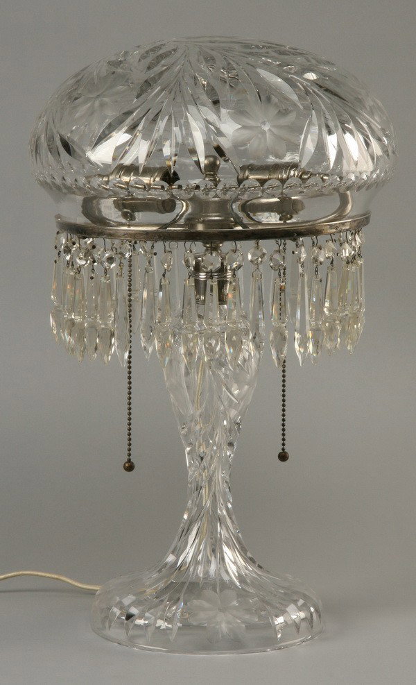Early 20th c. American cut crystal table lamp: Early 20th century American brilliant cut crystal table lamp, with finely detailed wheel cut floral designs, 21"h x 13" diameter.