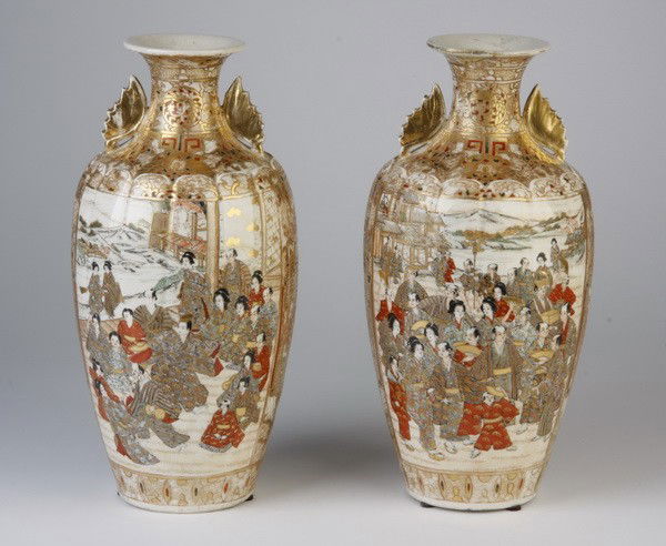 (2) Early 20th c. Japanese Satsuma vases: Pair of early 20th c. Japanese hand painted Satsuma earthenware vases, 12"h x 3.5" diameter base.