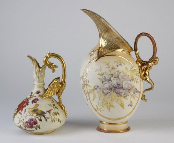 (2) 20th c. German, Austrian ewers: Two early 20th century German or Austrian ewers, on left 9"h x 6.5"w, on right 13.5"h x 9, maker marked "RW, Made in Austria" (Robert Hanke).