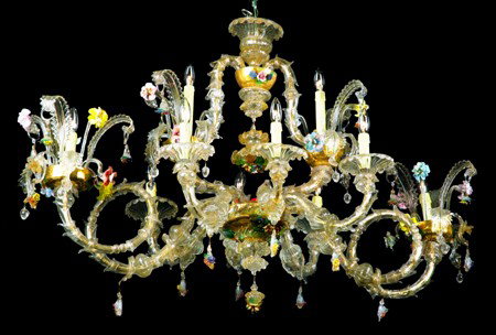 Venetian Murano glass chandelier: Venetian gondola-style Murano glass chandelier with gold accents and enamel over glass floral designs, 32"h x 55"w.