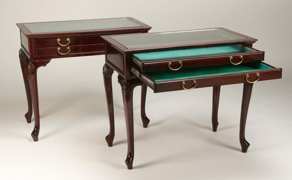 Pair of English mahogany display tables: Pair of English mahogany display tables, each with two felt lined pull-out drawers, and glass top, 31"h x 36"l x 20"d.