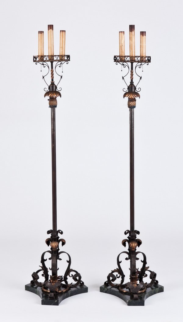 (2) Early 20th c. iron and tole torcheres: Pair of early 20th century Venetian iron and tole 3-light torcheres, each on a triangular shaped marble base, 60"h.