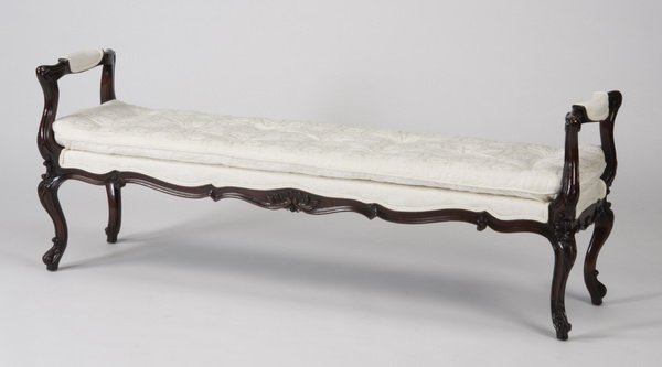 20th c. French Provincial style bench: 20th century French Provincial style carved mahogany window bench upholstered in ivory damask with button tufted seat, 23"h x 60"l x 16"w.