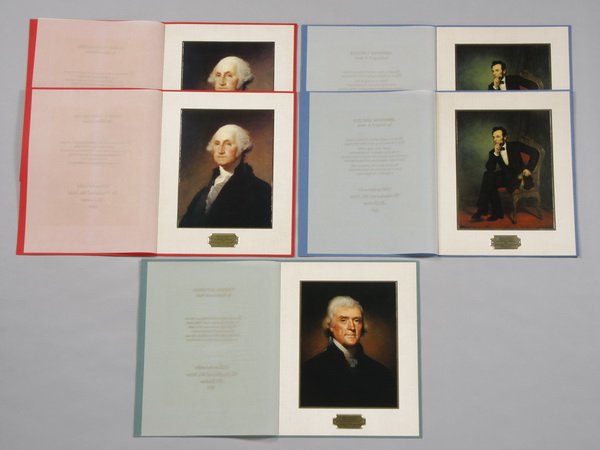 (20) Nixon Presidential Christmas cards: Grouping of 20 official Nixon White House Christmas cards: 9 oversized cards (13.75"h x 11"w) each with sueded cover embossed with the Presidential seal, the interior with parchment overlay protecting