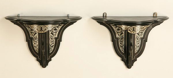 Pair of 19th c. ivory inlaid wall brackets: Pair of 19th century Italian serpentine shaped ebonized wall brackets with ivory inlaid designs, 13"h x 18"l x 10"d.