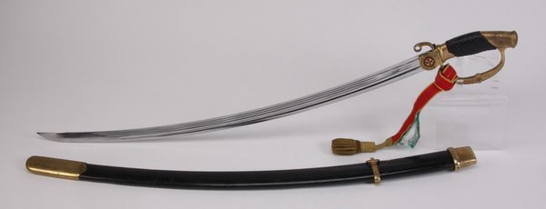 Late 19th c. Russian officer's shashka: Late 19th or early 20th century Russian dragoon officer's shashka, with a brass hilt, leather grip, nickel plated blade, and ebonized leather wrapped wood scabbard, the hilt engraved with a lion's hea