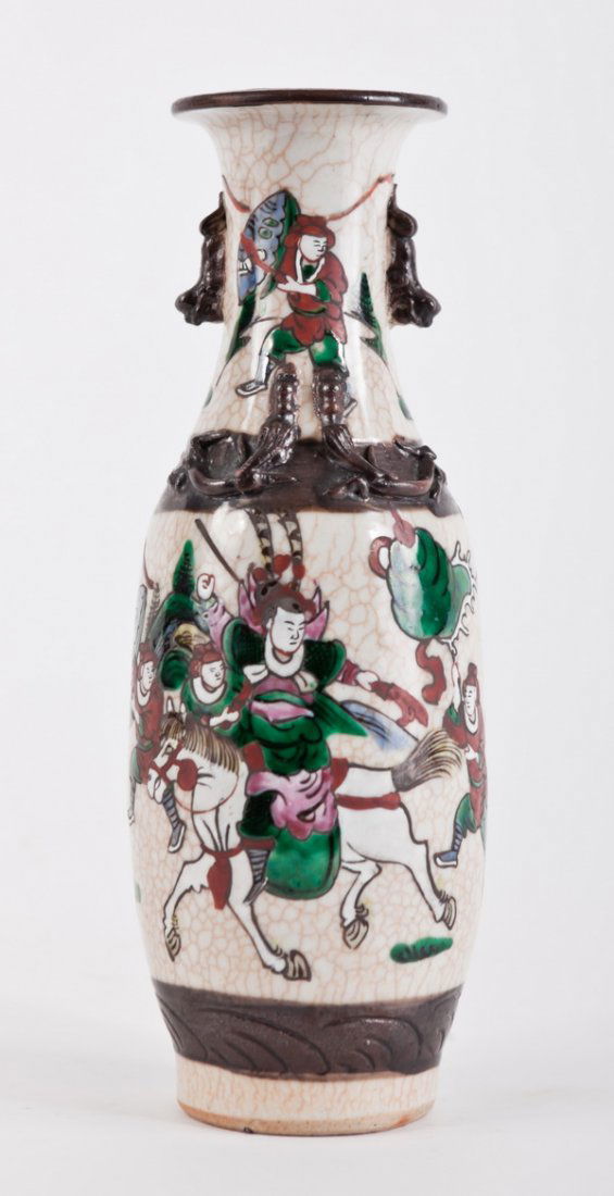 Chinese hand decorated earthenware vase: 20th century Chinese hand decorated earthenware vase depicting warriors engaged in battle, maker marked on bottom, 11.5"h x 3.25" diameter base.