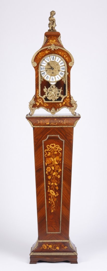 Italian inlaid clock and pedestal, 76"h: Mid 20th century Italian Louis XV style marquetry inlaid and gilt bronze mounted clock on tapering pedestal base, the face spuriously marked Tiffany, the mechanism maker marked FHS (Franz Hermle & Son