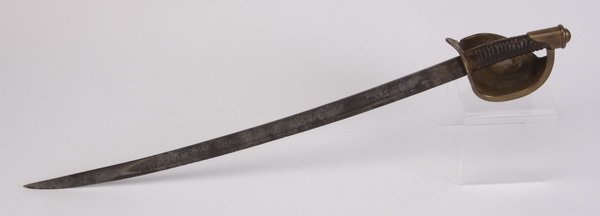 Civil War era M1860 U.S. Navy cutlass: Civil War era U.S. Navy cutlass, model 1860, with a brass hilt, leather and wire over wood grip, and nickel plated blade, the guard maker marked 7M, 16, 46, by the Ames Manufacturing Company, blade 26