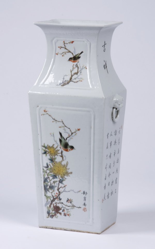 19th c. Chinese baluster form porcelain vase: 19th century Chinese square baluster form porcelain vase, the front and back decorated with scenes of birds among the branches, the sides with molded lion mask handles and Chinese writing, in shades o
