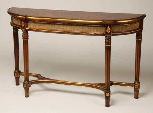 Carved and parcel gilt mahogany console: George III style carved and parcel gilt mahogany demi-lune console, 36"h x 60"w x 17"d.