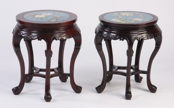 (2) Mid 20th c. Chinese cloisonne' stools: Pair of mid 20th century carved Chinese stools, the cloisonné tops decorated with birds and peonies on a turquoise ground, all raised on a circular base, 20.5"h x 18"d x 15.5" diameter.