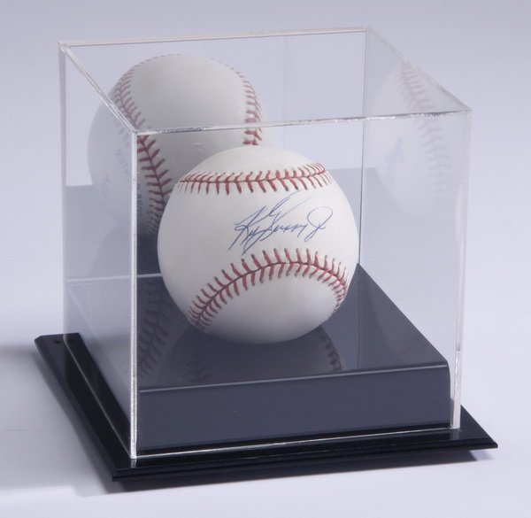 Ken Griffey, Jr. autographed baseball: 13-time All-Star Ken Griffey, Jr. autographed baseball, mounted in a plexiglass display case, case 5"h x 5.5" square.