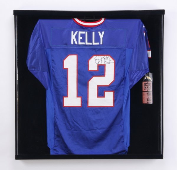 Jim Kelly framed autographed jersey: Framed and autographed Jim Kelly, Buffalo Bills #12 football jersey, the only number ever retired by the Buffalo Bills, signed "Jim Kelly, 12", mounted in a plexiglass display case, 35.5"h x 35.5"w x