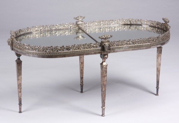 19th c. English silverplate coffee table: Mid to late 19th century English silverplate surtout la table redesigned as a coffee table, the rectangular mirror plate with D-shaped ends within a pierced gallery of grapevines with fruit-filled urn