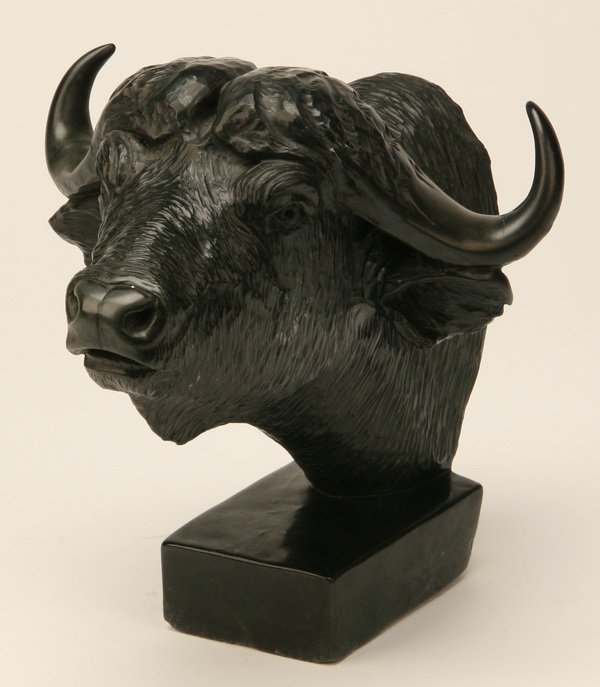Carved marble sculpture of cape buffalo mount: Mid 20th century carved marble sculpture of a cape buffalo shoulder mount, 11"h x 11"w x 10"d.