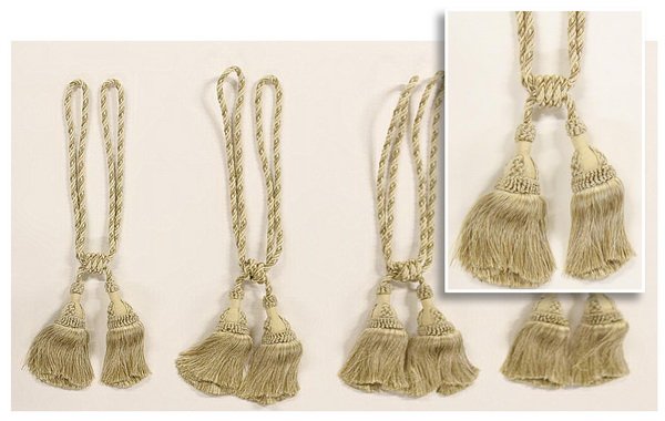 (4) Custom designed tie-backs or tassels: Set of four extravagant, custom designed and fabricated drapery tie-backs or tassels in shades of cream and gold, each 30"l x 11"w.