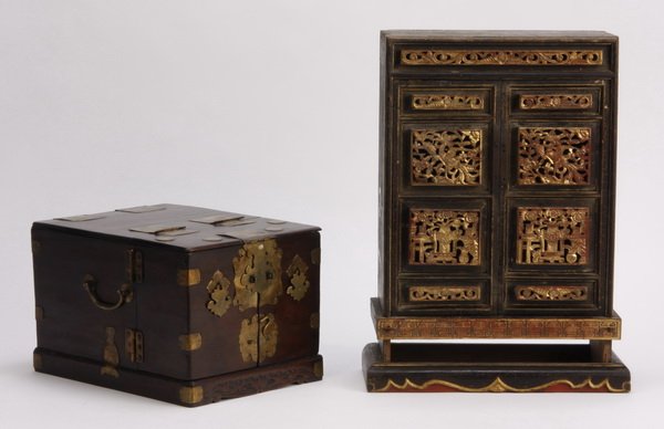 (2) Asian decorative wooden boxes: Pair of 20th century Asian decorative wooden boxes, includes (1) jewelry box, the hinged front panel, lid, and side panels opening to reveal a mirror and drawers, 7.5"h x 9"w x 12"d, (1) table top dis