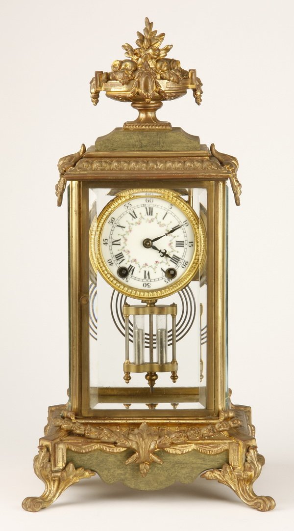 19th c. American bronze clock: 19th century American clock featuring a bronze urn at the crest, a mercury filled pendulum and original beveled glass panels, clock mechanism maker marked "R. Kaiser, Made in USA #51890", 17.5"h x 8.5