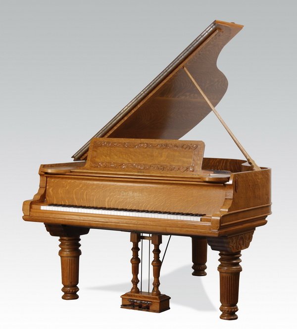 19th c. baby grand piano: Late 19th century American oak baby grand piano, circa 1890s, manufactured by Mehlin Piano Company, the case carved with foliate and shell details raised on fluted baluster legs, with coordinating lif