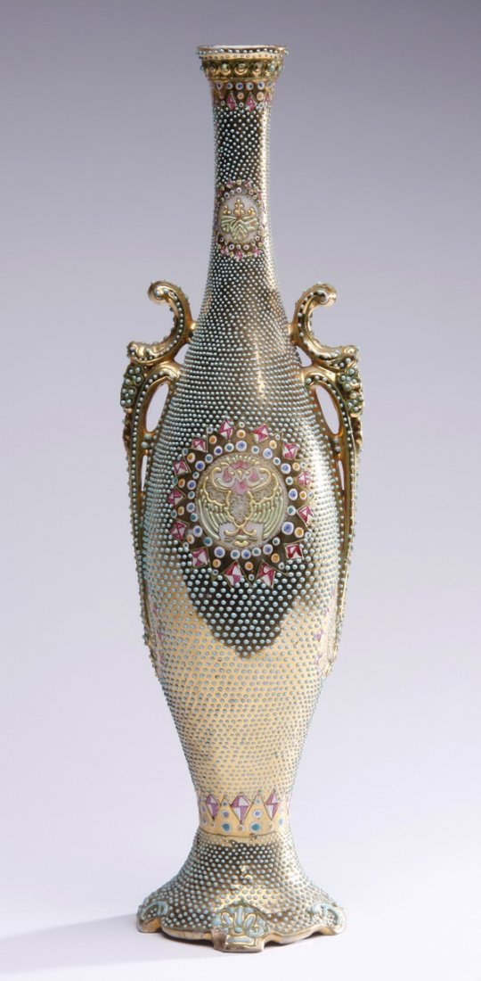 Late 19th c. Nippon hand decorated urn: Late 19th or early 20th century hand decorated porcelain double handled urn, with polychrome enameled floriate and geometric designs against a field of blue dots on a gilt ground, maker marked Nippon,