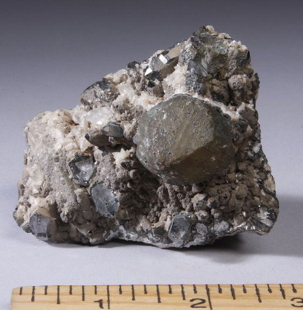 Russian uvarovite mineral specimen: Uvarovite XLS specimen, excavated in the Ural Mountains in Russia, 2"h x 4"l x 2.5"w.