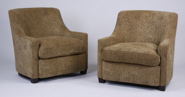 (2) Barbara Barry for Baker club chairs: Pairof Barbara Barry for Baker Furniture contemporary tub chairs upholstered in a neutral chenille brocade, with tight curved backs and loose seat cushions, over square tapering feet, paper tag marked