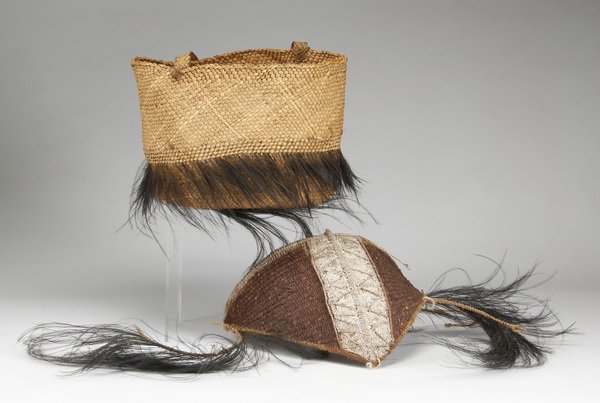 Headdress and bag, Papua New Guinea: Papua New Guinea headdress, worn during tribal ceremonies and singsongs, woven with cassowary feathers, rattan, and fiber, 10"h x 13"w x 8"d; together with a net bag or "bilum", used by women in Papua