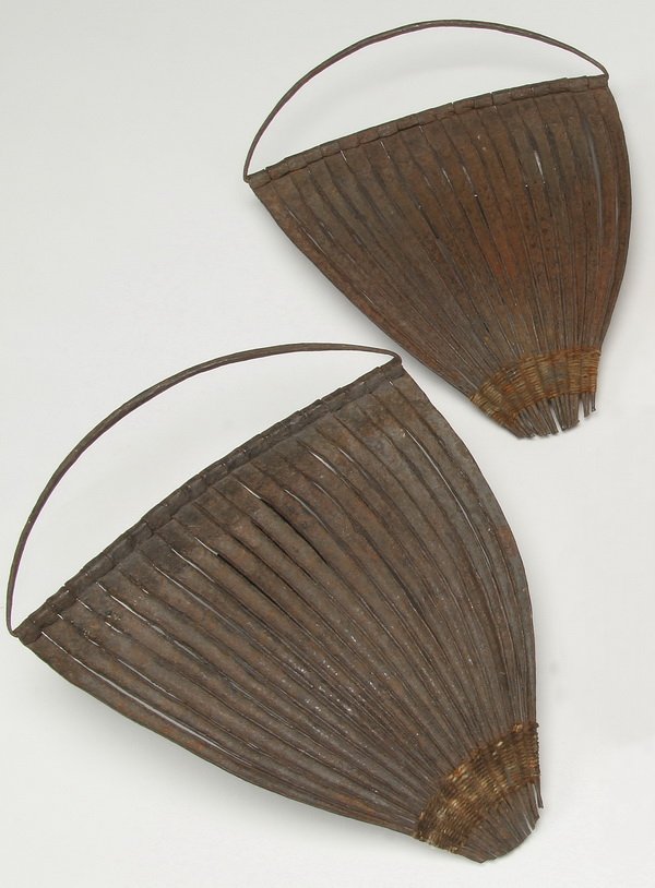 (2) 19th c. women's pubic covers: Two mid to late 19th century women's iron pubic covers or "pikuran", Kirdi tribe, Cameroon, worn by married women to indicate status, each 8"h x 6"w.