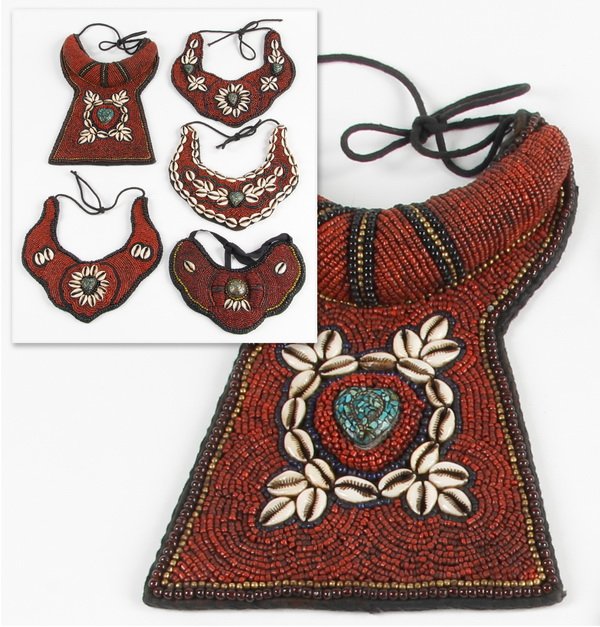 (5) Nepalese beaded neck bands: Group of five Nepalese beaded neck bands, made by local women during the rainy season, comprised of colored beads, shells, and semi-precious stones on a cloth backing, the largest 11"l x 7.5"w.