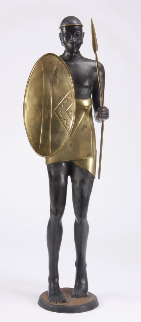 63"h bronze warrior sculpture, signed: 20th century bronze figural sculpture of an African warrior with shield and spear, mounted on a round base, artist signed B (Benjamin Mzimkulu) Macala (South African, 1938-1997), 63"h x 19"w x 19"d.