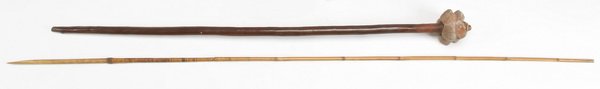 (2) Papua New Guinea weapons: Two Papua New Guinea weapons includes: (1) stone club with a star-shaped head, most likely ceremonial, 36.5"l x 2.5"w amd (1) bamboo arrow, the sharp tip secured by a rattan wrap, 51"l x .25"w.