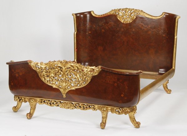Marquetry inlaid, parcel gilt queen bed: Mid 20th century Italian queen size parcel gilt burl wood bed, the curved headboard and footboard with central pierce carved scrolling acanthus leaves interspersed with flowers, flanked by marquetry i