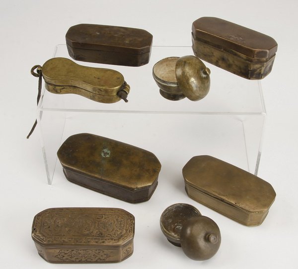 (8) Assorted Himalayan brass and silver boxes: Assorted group of eight Himalayan brass and silver boxes or "salapa", hand-crafted to carry tobacco and betel nuts, the largest 1.5"h x 5.25"l x 2.5"w.