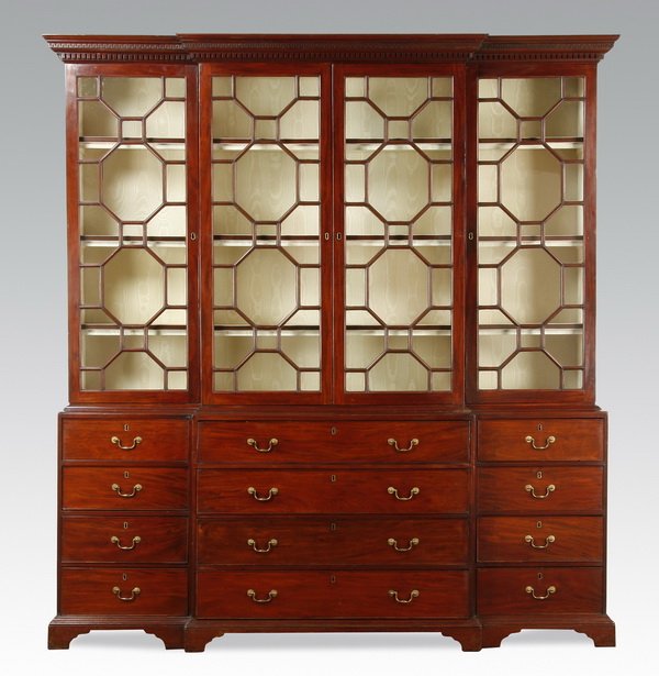 Late 18th c. English secretary bookcase: Late 18th or early 19th century English mahogany secretary bookcase, of breakfront form with a molded dentil cornice over four glass panel doors, each with individually mullioned geometric panes, the 