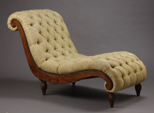 Contemporary button tufted chaise: Contemporary button tufted s-shaped chaise with a carved hardwood frame upholstered in muted chartreuse brocade with nail head trim, the small hidden drawers on either side below the seat are ideal as