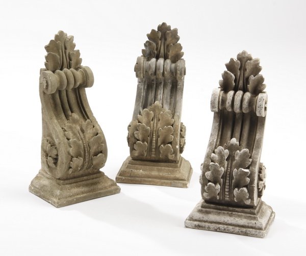 (3) Cast stone corbels: Set of three acanthus-form cast stone corbels, each 21"h x 6"w x 7"d.