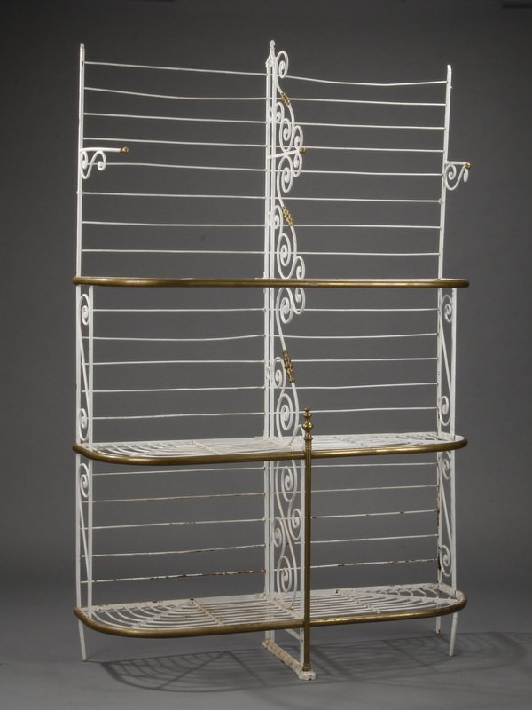 Mid 20th c. French wrought iron baker's rack: Mid 20th century French wrought iron demilune baker's rack, with three sets of shelves divided by scrolling center supports, painted white with brass details, maker marked Damerval Freres, Paris, 91"h