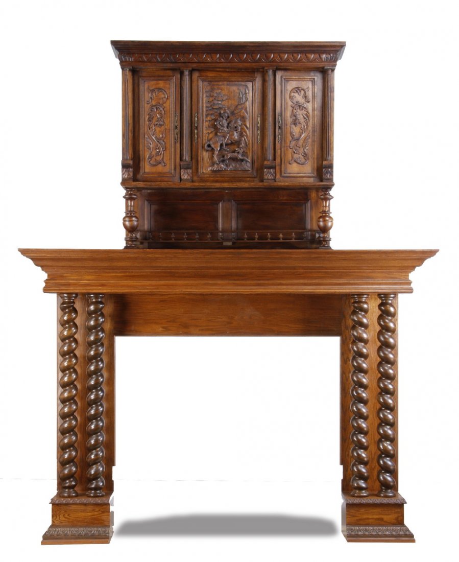 Monumental 19th c. oak mantel, 114"h: Monumental late 19th century carved oak fireplace mantel, the firebox flanked by double pairs of spiral twist columns supporting a massive mantel shelf, the overmantel with concealed storage and relie
