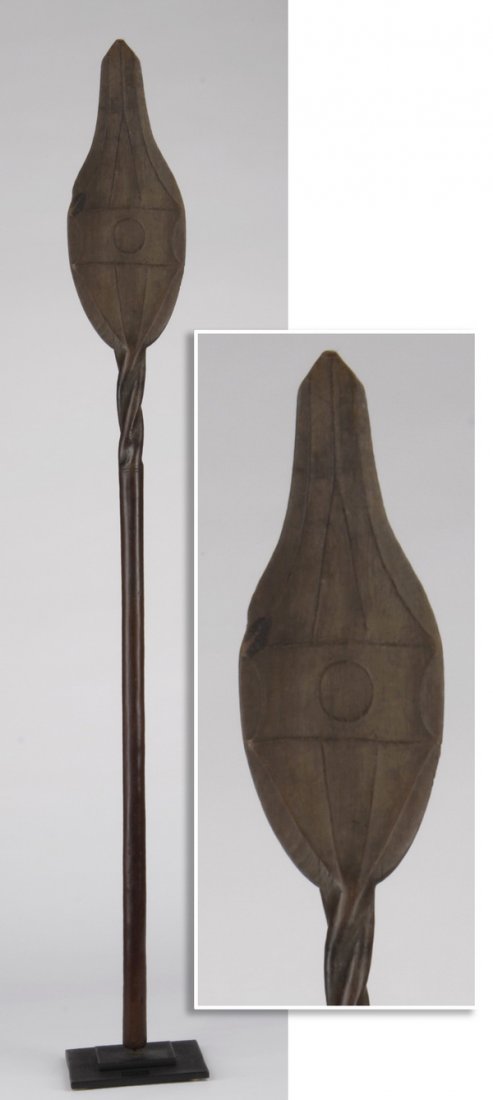 53"h West African ceremonial spear, pre 1950: West African ceremonial spear, pre 1950, carried in processionals to symbolize the tribe's strength, the carved wood form with a leaf-shaped blade, embellished with geometric details, above a twisted 