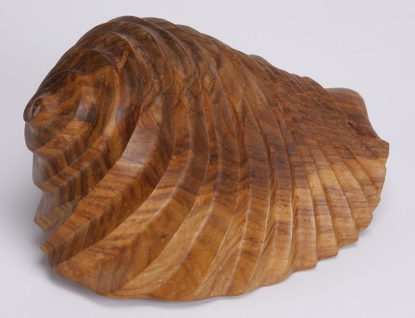 10"l hand carved seashell: Mid to late 20th century carved walnut sculpture in the form of a seashell, 4.5"h x 9.5"l x 7"w.