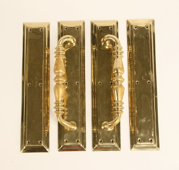 Wimbledon Court bronze handles: Two pairs of English bronze door handles and matching pushplates, removed from the Debentures Bar Centre Court Wimbledon, when this venue was remodeled in 2006, 14.5"l x 3"w.