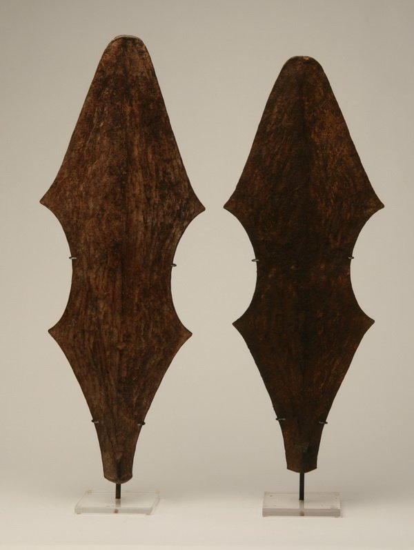 Pair of African forged iron currency units: Pair of African forged iron currency units from Cameroon, with stands, for decorative display, 27.5"h x 10"w.
